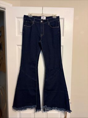 High-Rise Dark Indigo Flare Jeans with Frayed Hem